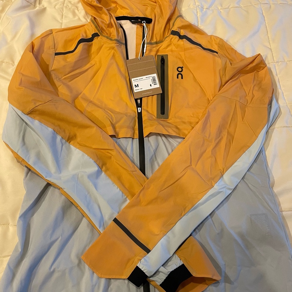 NWT On Running Women’s Weather Jacket Mango/Hail color - Picture 2 of 4